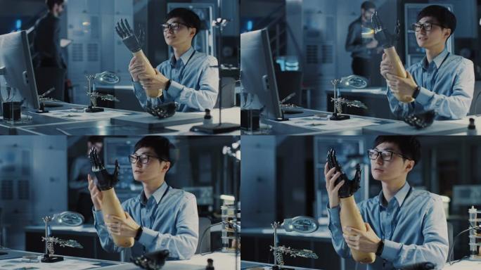 未来的假肢机器人手臂由专业的日本开发工程师在高科技研究实验室中使用现代计算机设备进行测试。他对结果感