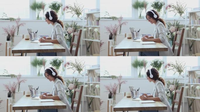 女花店设计师在线学习在笔记本电脑上观看视频课程