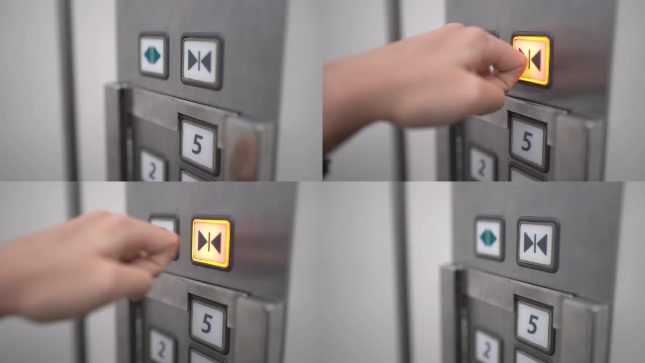 女人的手避免用指尖按下电梯或电梯内的按钮