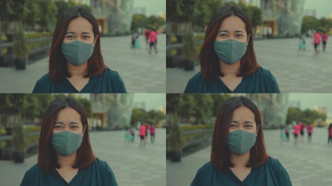 新常态: 戴着防护医用口罩的亚洲妇女