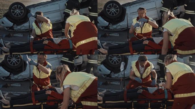 在车祸交通事故现场: 医护人员挽救了躺在担架上的乘客的生命。他们听心跳，使用氧气面罩，设置下降计数器