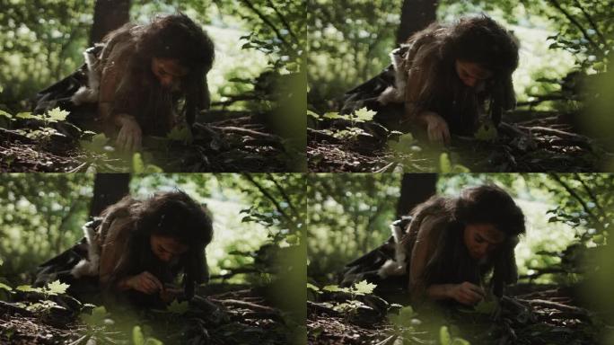 史前洞穴妇女狩猎采集者在森林中寻找坚果和浆果。原始尼安德特人妇女在阳光明媚的森林中寻找食物
