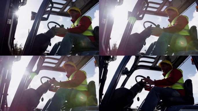 仓库工人在工厂外驾驶叉车