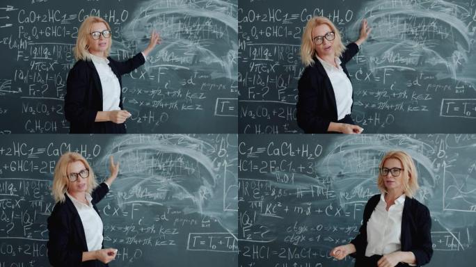 在黑板附近的课堂上教授科学的成年女性慢动作