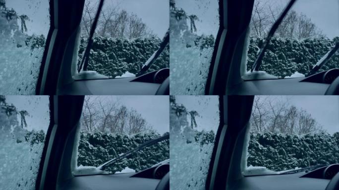 汽车刮水器清洁窗户上的雪