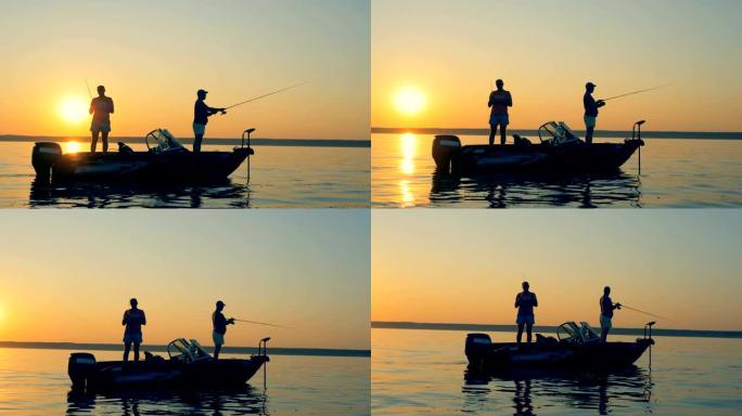 两名男性渔民在日出期间的捕鱼过程