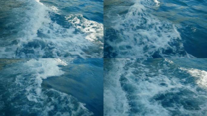 船后的水泡沫痕迹海波海浪翻滚