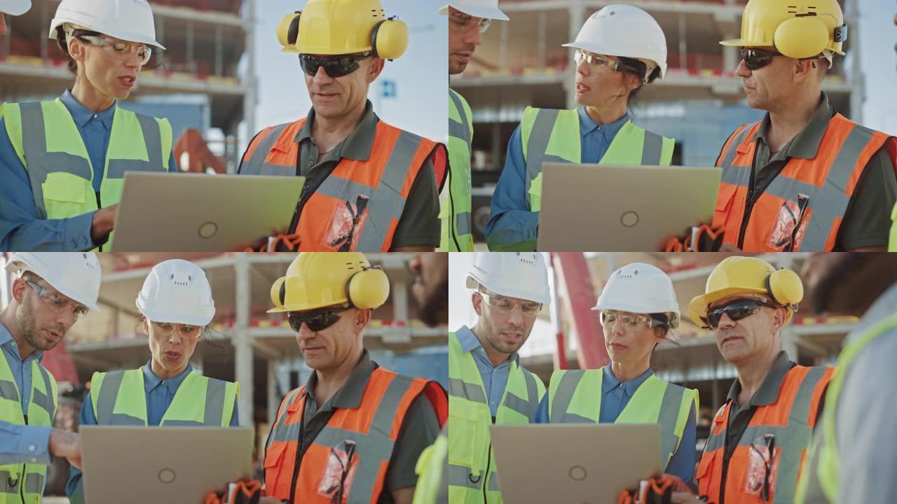 不同的专家团队在建筑工地使用笔记本电脑。带有机械的房地产建筑项目: 土木工程师，投资者，女商人和建筑