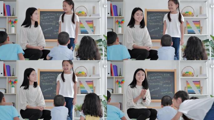 领导的微笑亚洲小女孩站在小学班级的演讲中。友谊，领导，教育，孩子，成功，志愿者，领导，教育，返校概念