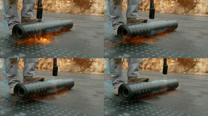 封闭劳动者将一卷焦油融化到正在建造的房屋的地基上