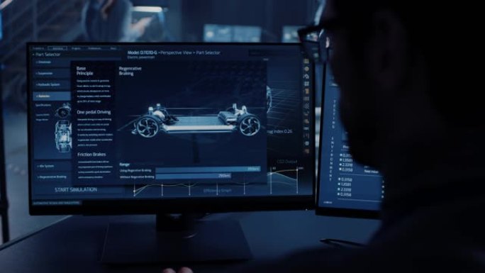专业工程师使用3D cad软件在计算机上工作，并在高科技开发实验室中测试带有车轮，电池和发动机的电动