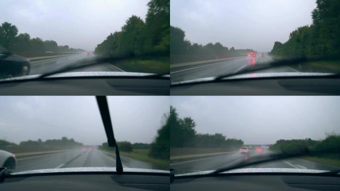MS挡风玻璃刮水器清除了沿高速公路行驶的汽车上的雨水