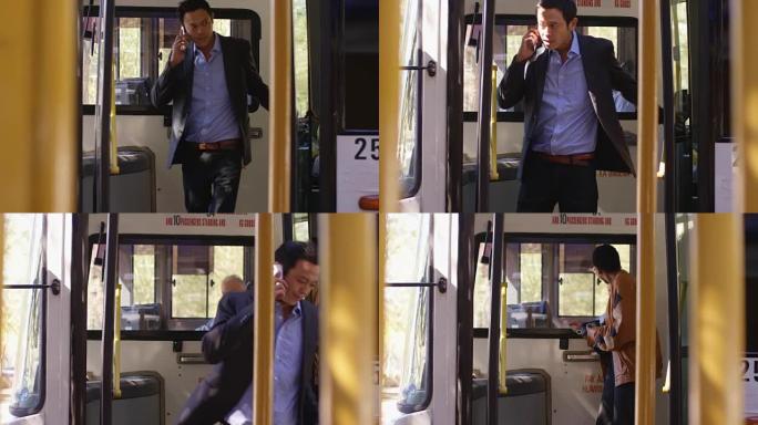 商务通勤者从4k公交车下车时用手机通话