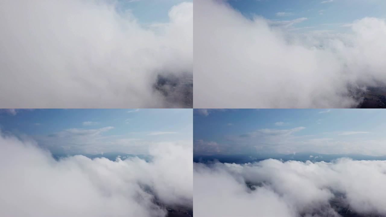 在云层上方的云层上进行空中拍摄，具有日出时间，梦想和灵感概念