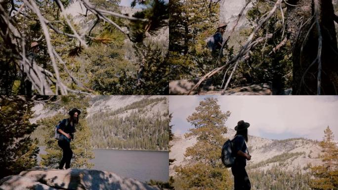 约塞米蒂国家公园森林湖慢动作时，年轻的当地女孩背着背包在美丽的岩石中徒步旅行。