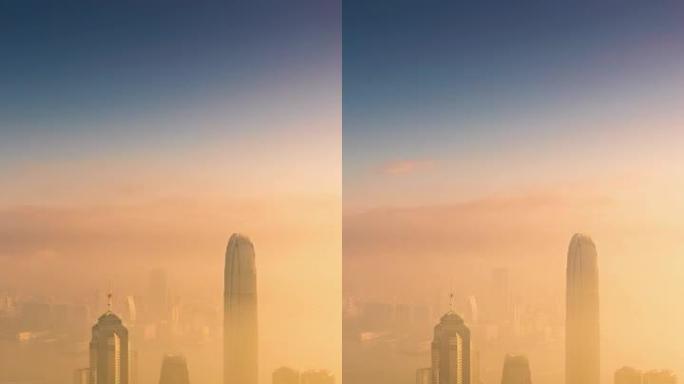 (垂直) 日出时香港摩天大楼和城市景观的延时。