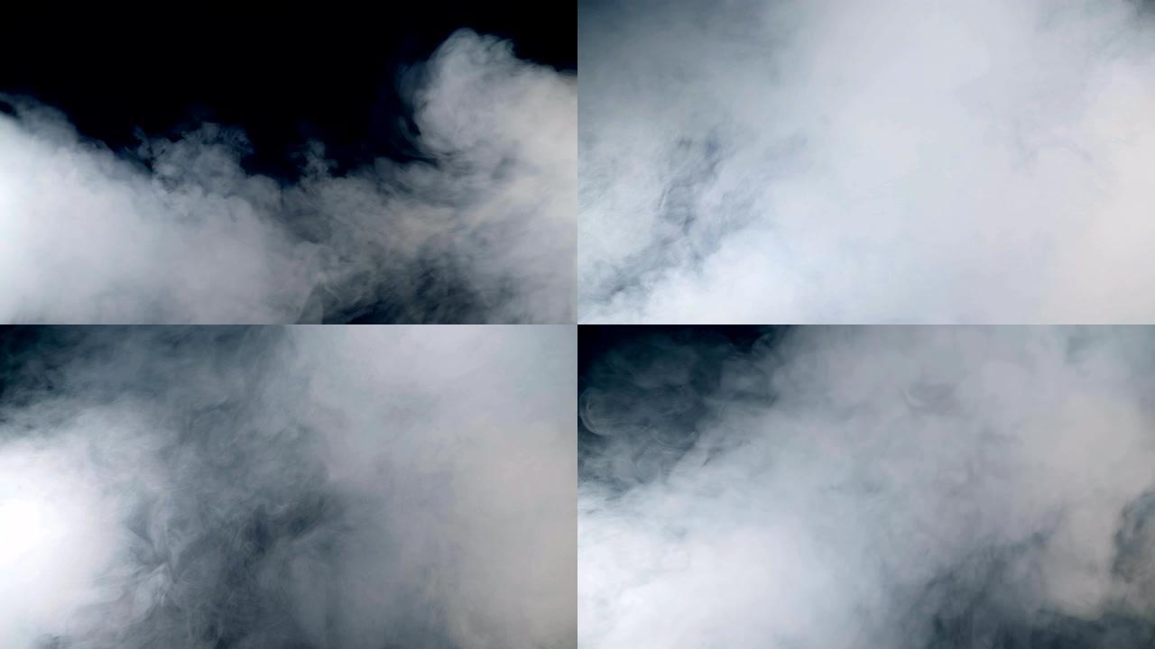 阵阵烟雾正在迅速蔓延。雾，烟，云隔离在黑色背景上。