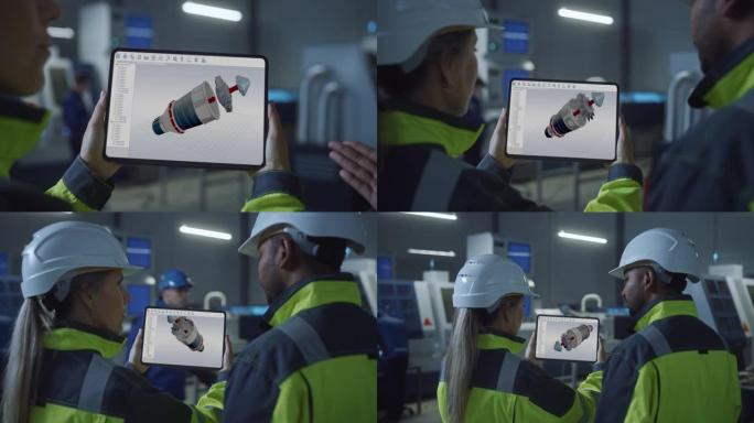 工业4.0工厂: 总工程师和项目主管在安全背心和安全帽，谈话，使用数字平板电脑，屏幕显示新的电动涡轮