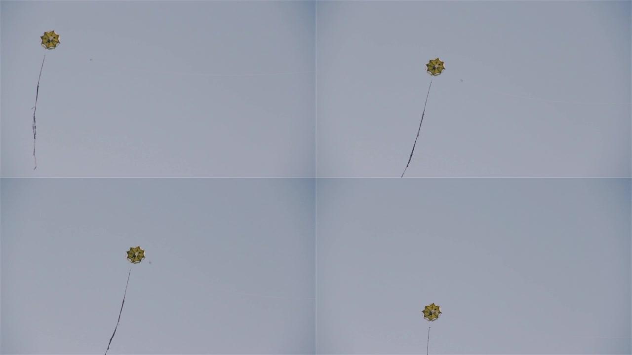 风筝在蓝天上飞翔。