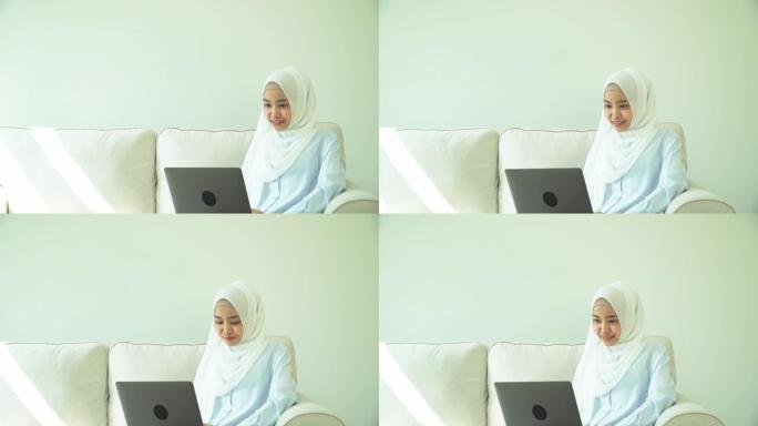 亚洲穆斯林妇女在家工作