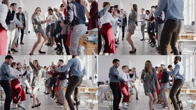 快乐有趣漂亮的年轻金发老板女商人与多民族团队跳舞在办公室派对慢动作红色史诗。