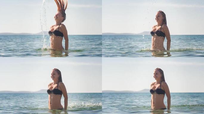 年轻女子在水中扔头发