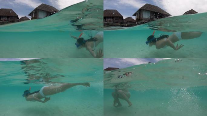 亚洲女子潜水水蛙泳享受运动