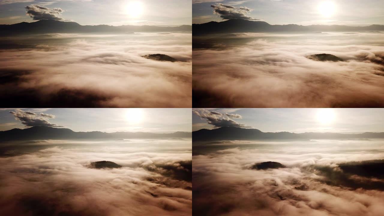 薄雾随日出在山上移动的时间流逝