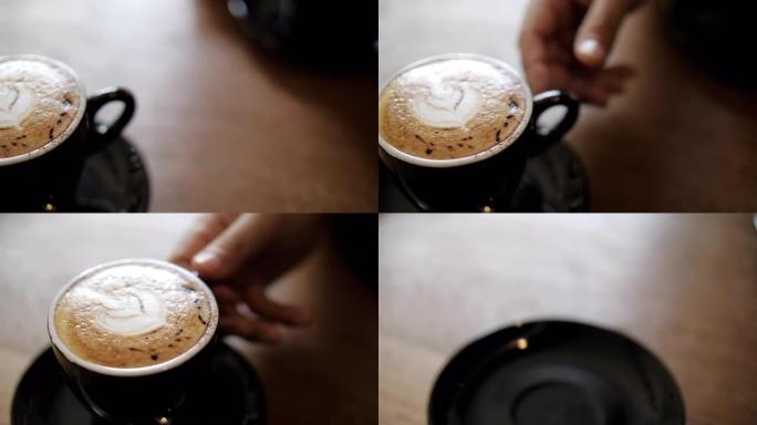 喝咖啡，人类的手在咖啡馆喝咖啡