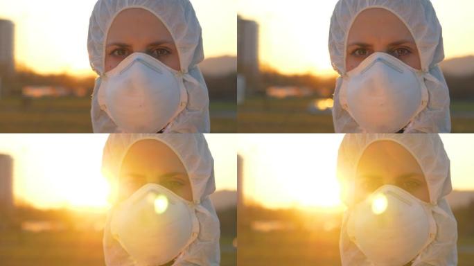 肖像: 戴着口罩和西装的女医生在日落时站在外面