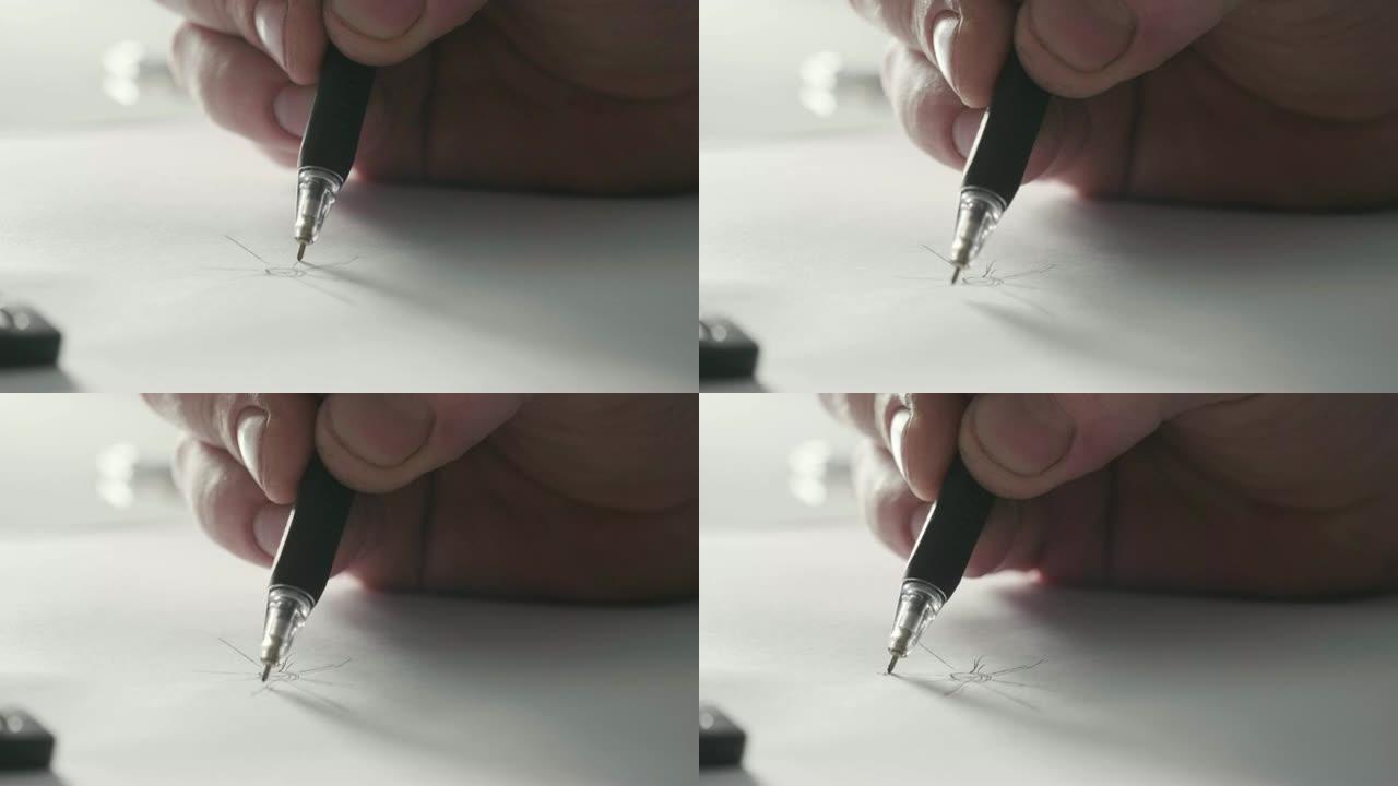 一个人的特写画一个投射在白纸上的新环设计。
