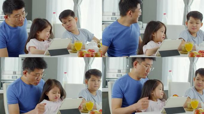 亚洲父亲和孩子早上吃早餐