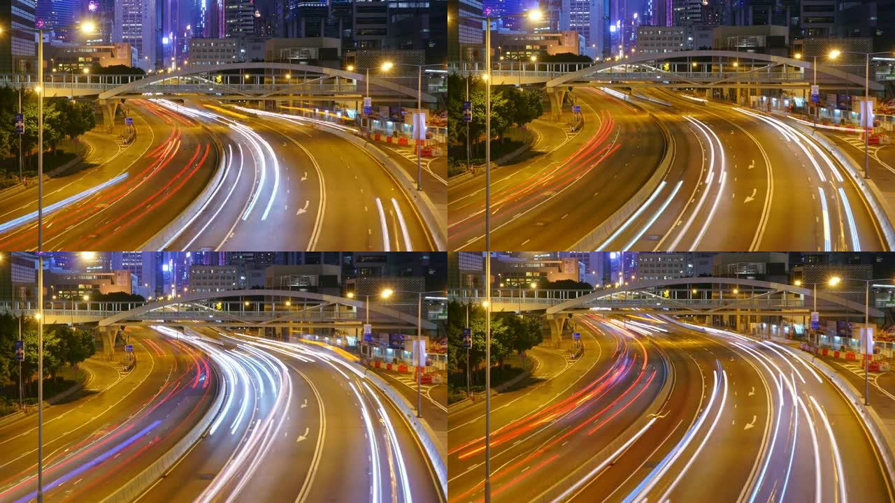 (向下倾斜) 交通延时和香港摩天大楼景观在夜间。