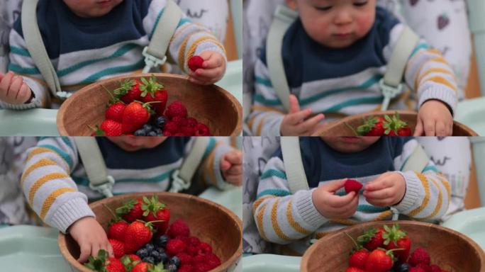 分享他的水果小孩吃草莓