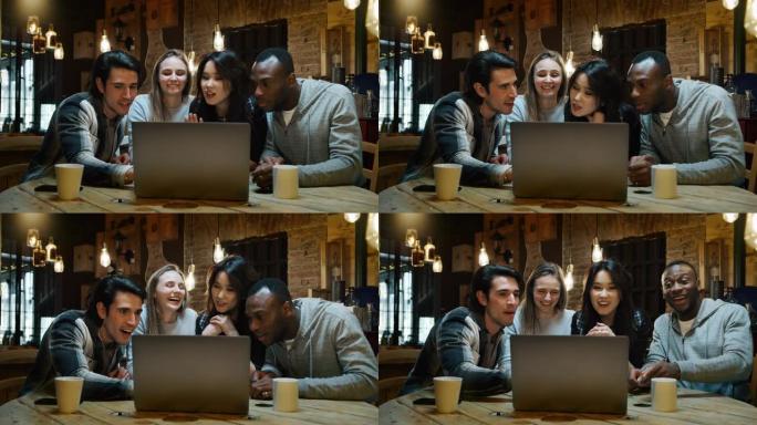 年轻的大学朋友一起使用笔记本电脑进行学习项目并在咖啡馆喝茶的慢动作。
