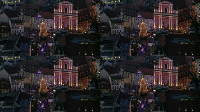 斯洛文尼亚卢布尔雅那城镇广场夜间圣诞树和灯光的MS视图