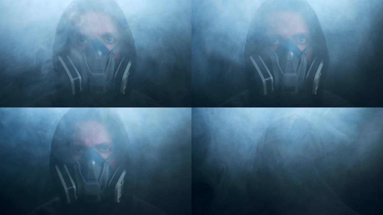 一个戴着防毒面具的人看着相机，然后转身走开，消失在烟雾中。