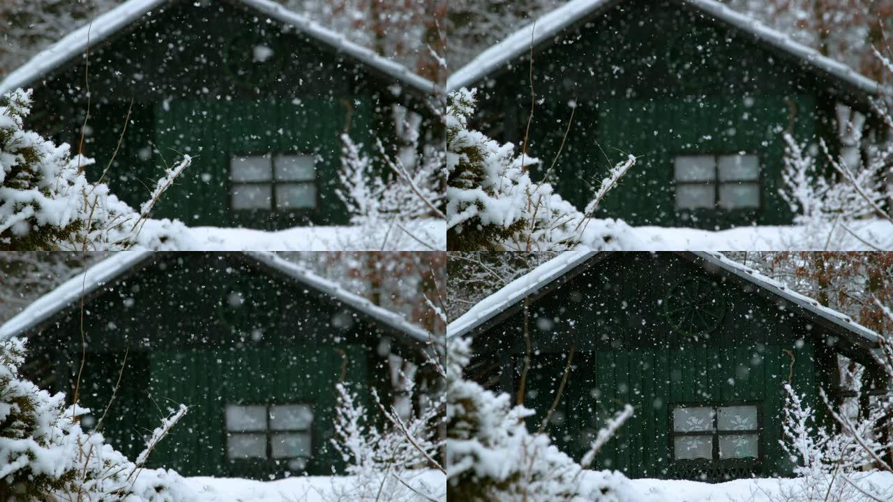 慢动作: 雪天宁静的森林和木屋的美景。