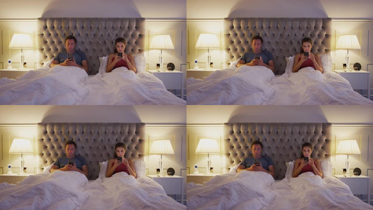 夫妻躺在床上检查手机，却忽略了对方