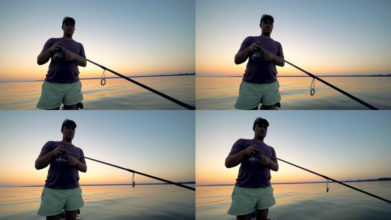 男性垂钓者在钓鱼过程中re绕一根钓鱼竿的梭芯