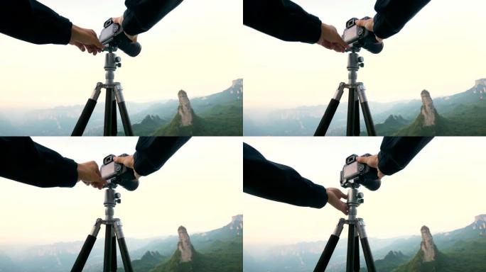 摄影师拍摄山脉的风景