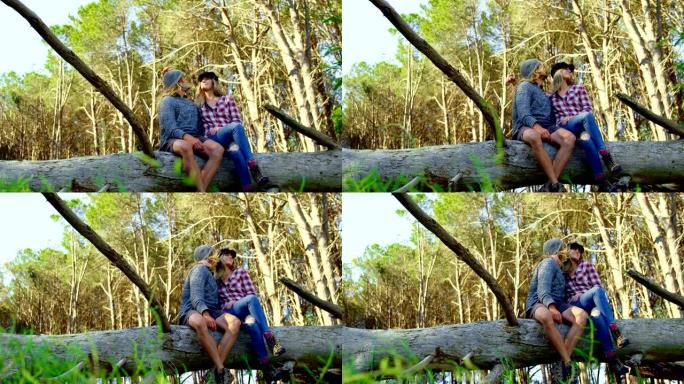 浪漫的年轻情侣在森林里互相亲吻4k