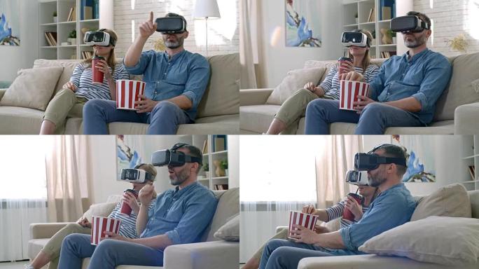 情侣戴着VR眼镜看电影