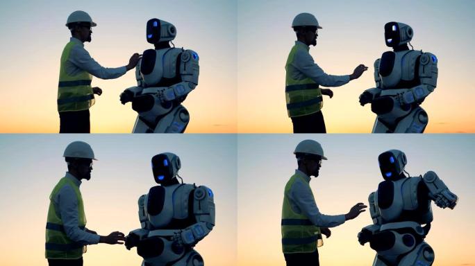男人在日落背景下与机器人一起工作，特写。