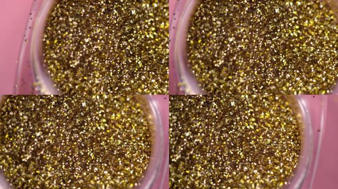 化妆用金色闪光的宏观