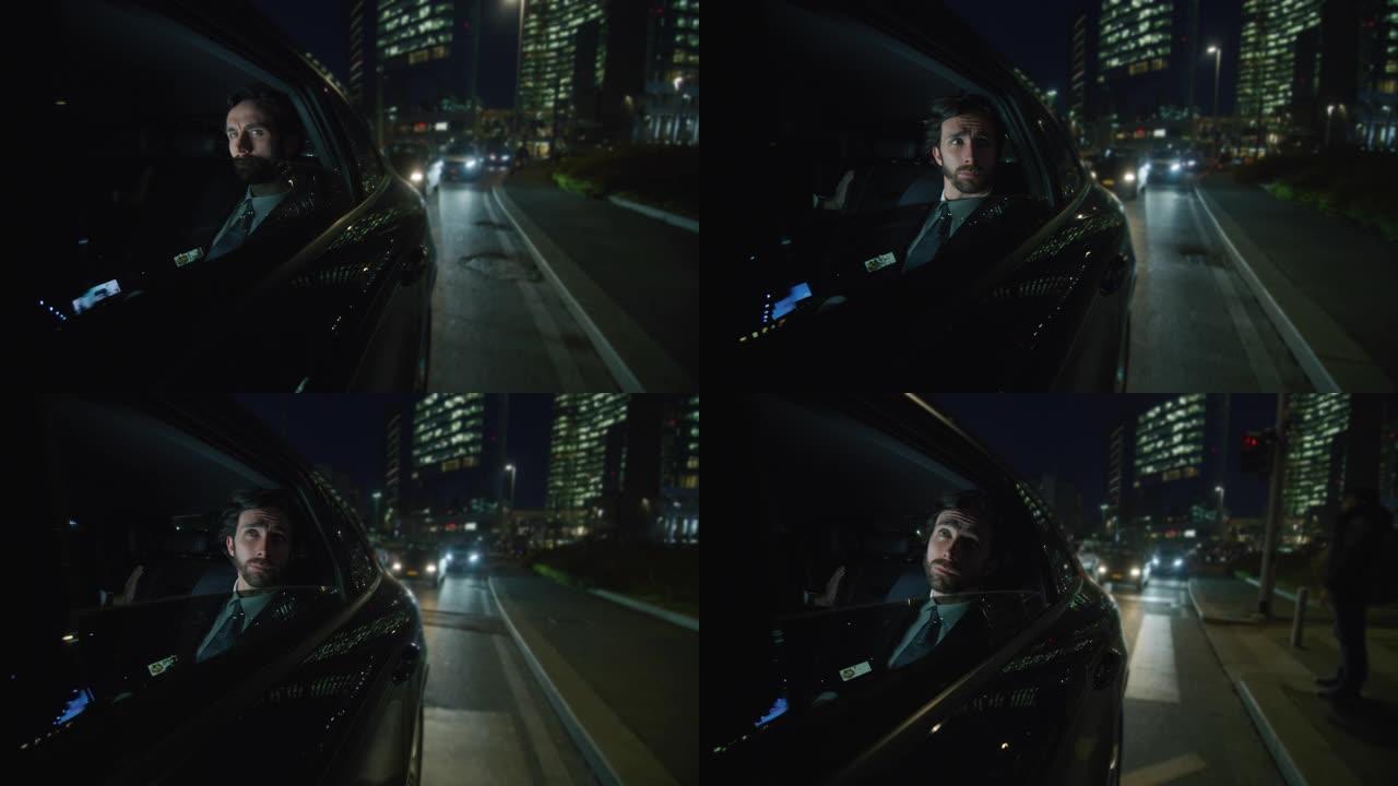 慢动作的年轻英俊的商人在一个现代汽车旅行期间与一个司机在市中心的夜晚