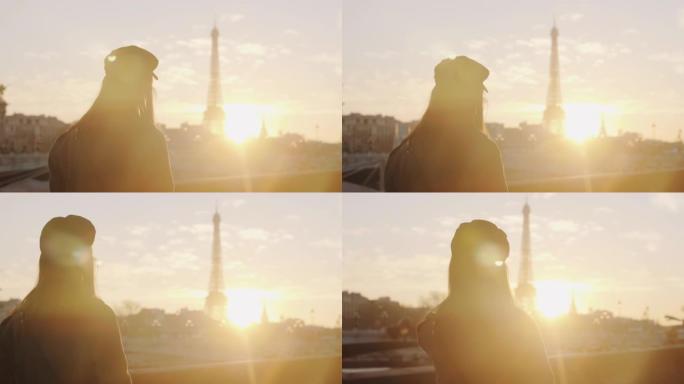 电影的后视图，快乐的女人沿着史诗般的镜头耀斑日落塞纳河和巴黎的埃菲尔铁塔慢动作行走。