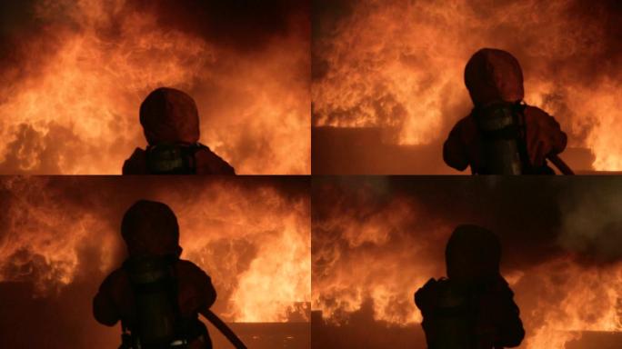 一名勇敢的消防员勇敢的消防员大火背景火灾