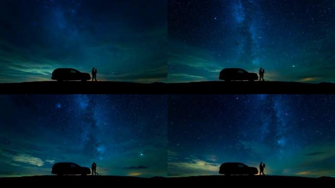 这对夫妇站在星空背景上的一辆汽车附近。时间流逝