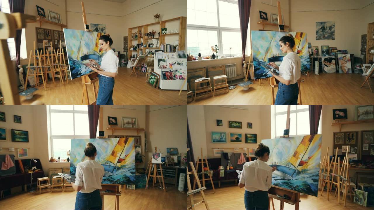 严肃的艺术家在工作室里工作，站在画架前，用调色板和画笔，用丙烯酸涂料绘画船和海浪。人和爱好概念。
